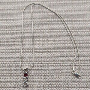 18 Inch Sterling Silver Multiple Hearts Single Garnet Necklace A4095